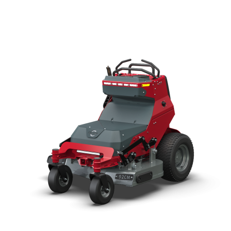 Red and grey compact lawn mower with a side discharge and protective frame.